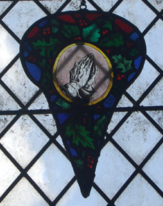 Fragment of stained glass in the north aisle May 2010